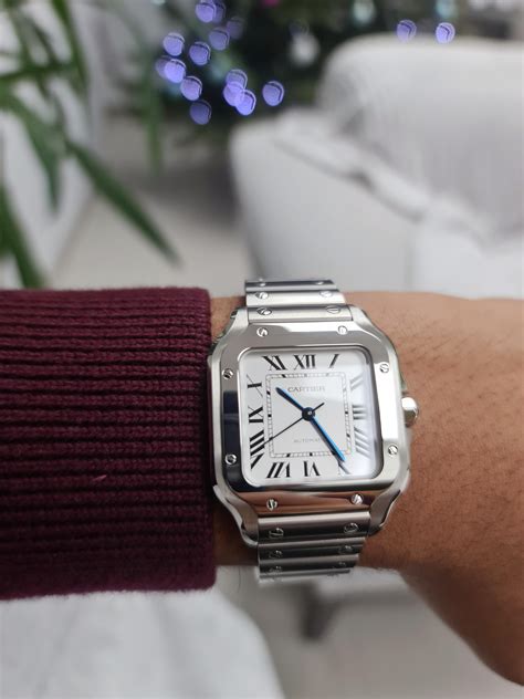 cartier santos medium on wrist.